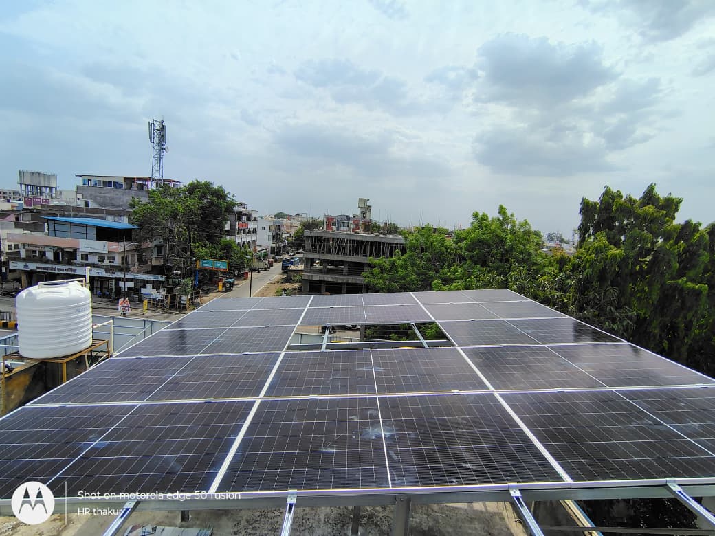 Modern luxury villa with infinity pool overlooking ocean, floor-to-ceiling windows, and contemporary architecture