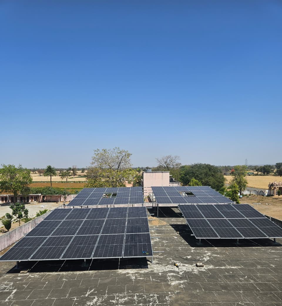 Modern luxury villa with infinity pool overlooking ocean, floor-to-ceiling windows, and contemporary architecture